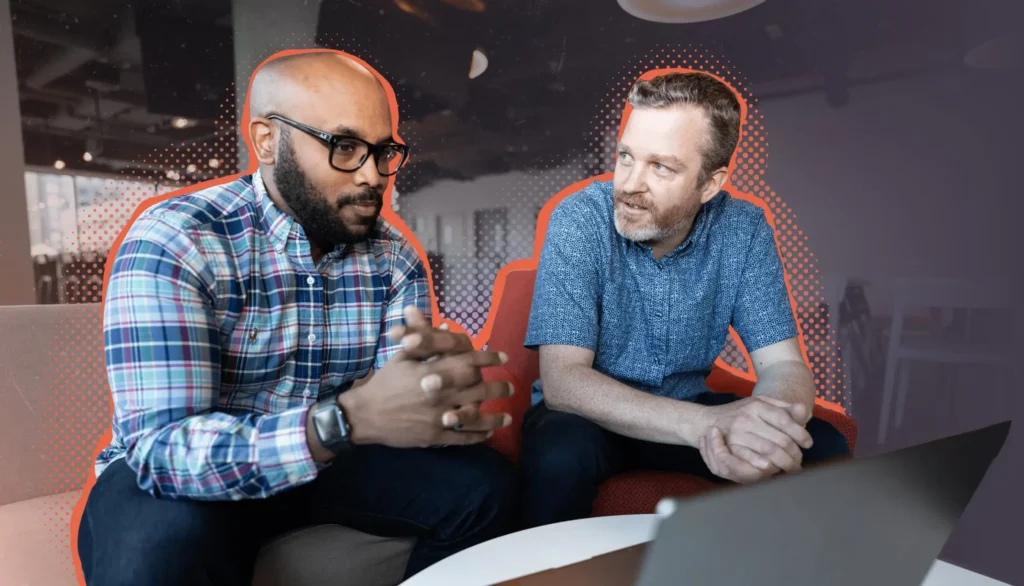 Marlon and Seb discussing a project