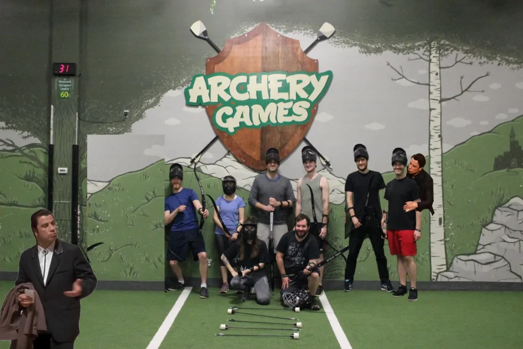 team posing for a social event at Archery Games