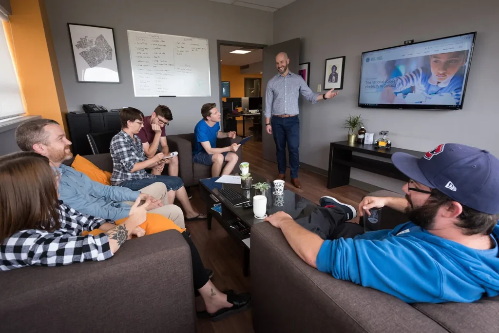 Chad presenting a site to the team in the chill room