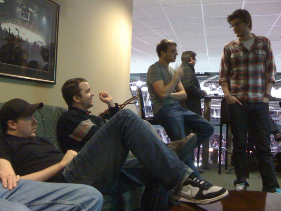 Employees watching the Sens play